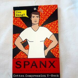 Men’s white compression tee shirt by SPANX. Excellent condition.